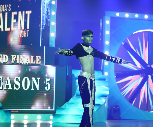 Contestant stepping onto the India's Talent Fight national stage under spotlight for live talent performance