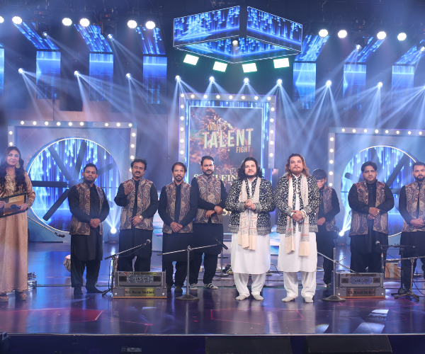 Contestant executing a dramatic peak performance move on the India's Talent Fight TV Reality Show stage