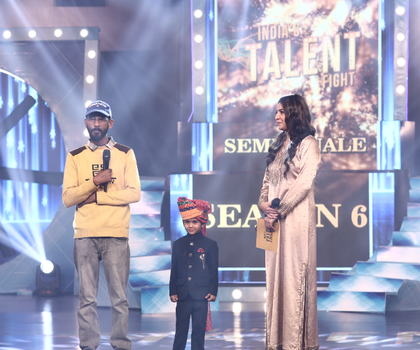 Dancer performing acrobatic flexibility stunt on India's Talent Fight stage