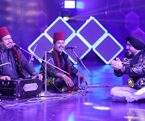 Contestant receiving official selection card on India's Talent Fight national audition