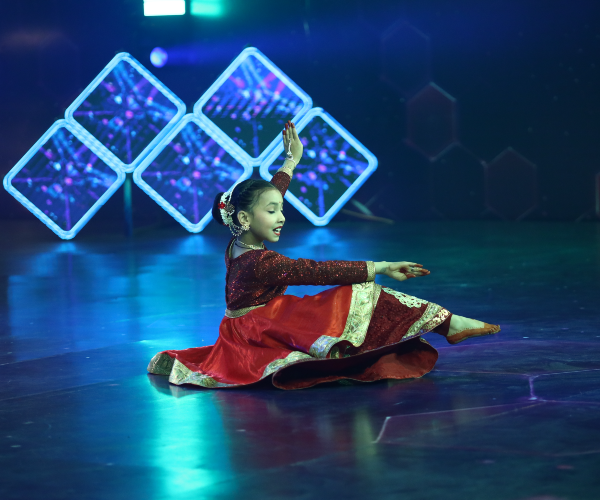 Singer delivering classical devotional bhajan on India's Talent Fight TV Reality Show