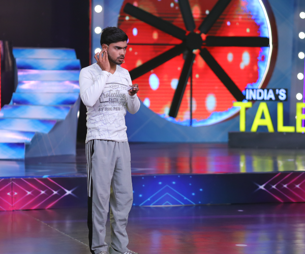 Judges awarding Golden Buzzer selection on India's Talent Fight Reality Show